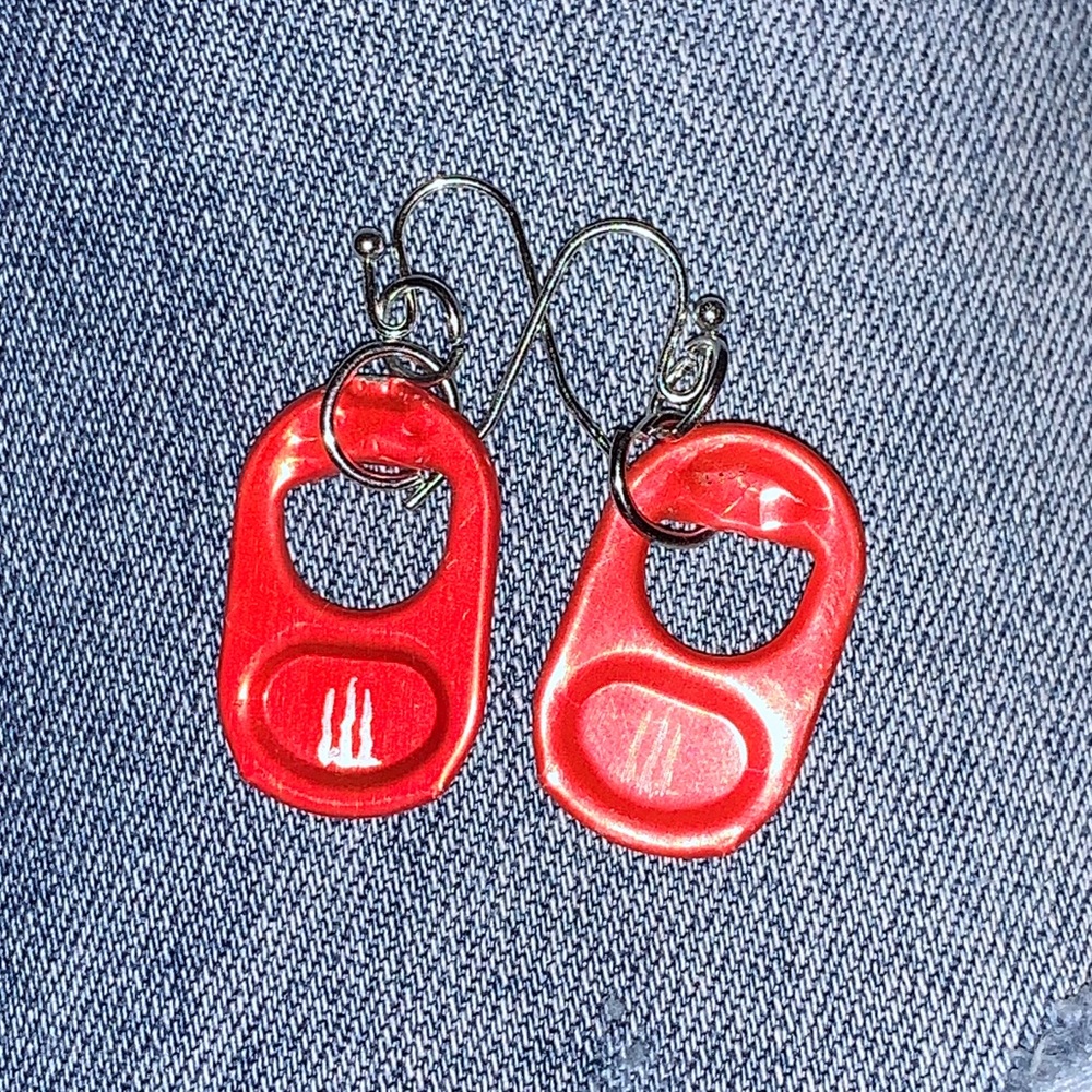 red monster tab ear rings. dangly